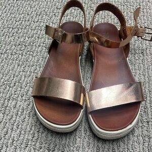 Rose gold sandals from Roolee